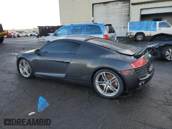 2010 Audi R8 z VIN WUAAUAFG0AN000963, wystawiony jako Copart lot #84955394 z przebiegiem 96 738 mil mil oraz Szkody całkowita. Historia ofert i sprzedaży dostępna na DreamBid. Obrazek 2.