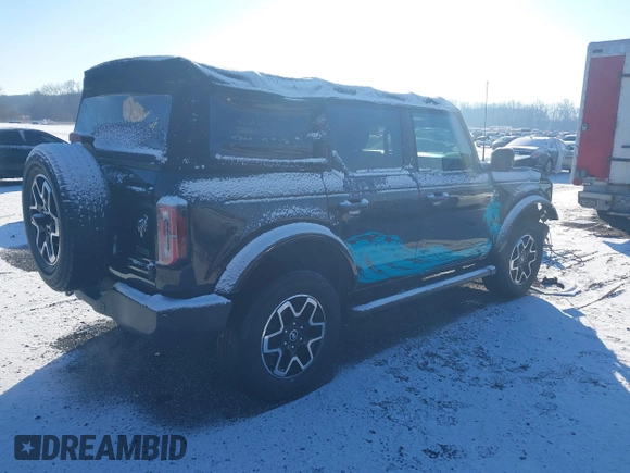 2021 Ford Bronco with VIN 1FMDE5BH7MLB07372, listed as a IAAI auction lot 41297961 with 80,291 mi miles. Bid and sale history available at carsss.com. Image 4.