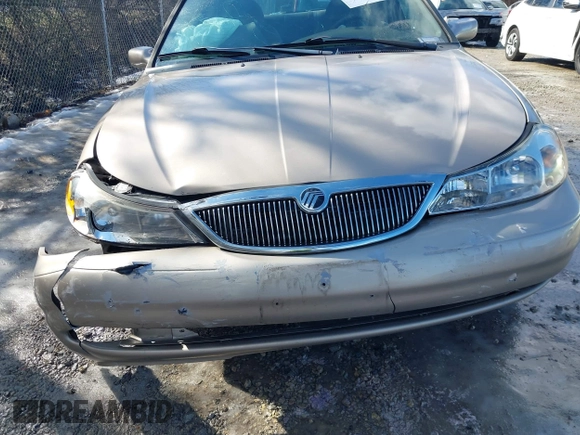1999 Mercury Mystique GS z VIN 1MEFM6530XK635463, wystawiony jako IAAI lot #41478903 z przebiegiem 87 911 mil mil oraz . Historia ofert i sprzedaży dostępna na DreamBid. Obrazek 17.