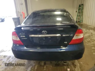 2003 Toyota Camry LE z VIN 4T1BF30K23U058761, wystawiony jako Copart lot #51286985 z przebiegiem 90 143 mil mil oraz Nie do naprawy • Non repairable. Historia ofert i sprzedaży dostępna na DreamBid. Obrazek 6.