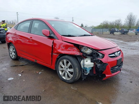 2012 Hyundai Accent GLS with VIN KMHCU4AEXCU168661, listed as a IAAI auction lot 41963258 with 216,006 mi miles. Bid and sale history available at carsss.com. Image 1.