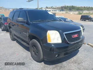2007 GMC Yukon SLT z VIN 1GKFK13037R139359, wystawiony jako IAAI lot #41970118 z przebiegiem 141 486 mil mil oraz . Historia ofert i sprzedaży dostępna na DreamBid. Obrazek 1.
