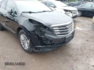 2017 Cadillac XT5 Luxury AWD with VIN 1GYKNDRS9HZ149675, listed as a IAAI auction lot 42329454 with 77,257 mi miles and . Bid and sale history available at DreamBid. Image 6.