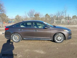 2015 Hyundai Sonata 2.4L Sport with VIN 5NPE34AF6FH174223, listed as a IAAI auction lot 41748484 with 100,492 mi miles. Bid and sale history available at carsss.com. Image 13.