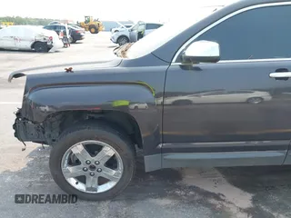 2013 GMC Terrain SLT z VIN 2GKFLWE31D6120642, wystawiony jako IAAI lot #42409573 z przebiegiem 148 224 mil mil oraz . Historia ofert i sprzedaży dostępna na DreamBid. Obrazek 15.