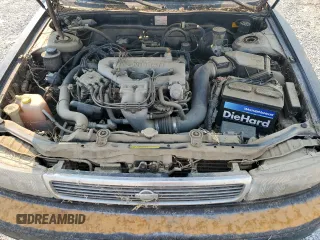 1992 Nissan Maxima z VIN JN1HJ01F1NT007180, wystawiony jako Copart lot #71271334 z przebiegiem 252 299 mil mil oraz Tytuł czysty. Historia ofert i sprzedaży dostępna na DreamBid. Obrazek 11.