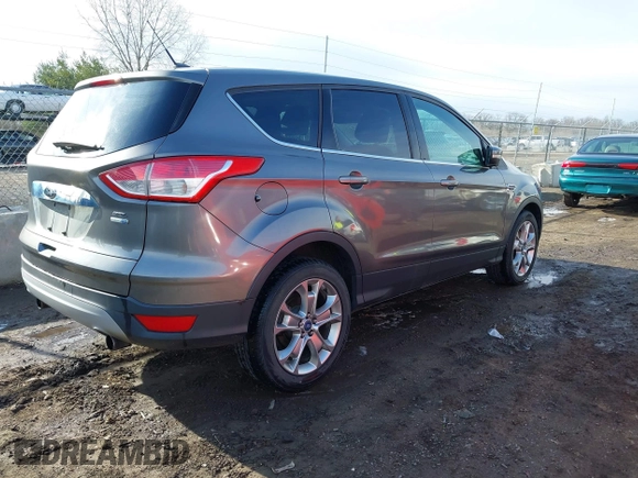 2013 Ford Escape SEL with VIN 1FMCU9H92DUA24934, listed as a IAAI auction lot 41832566 with 124,705 mi miles. Bid and sale history available at carsss.com. Image 4.