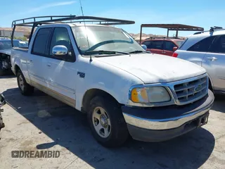 2001 Ford F-150 XLT with VIN 1FTRW07W21KE19926, listed as a IAAI auction lot 42750523 with Not provided miles and . Bid and sale history available at DreamBid. Image 1.