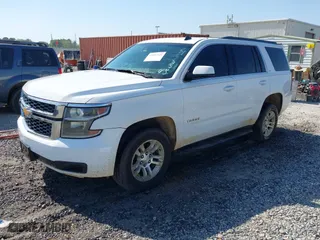 2015 Chevrolet Tahoe LT with VIN 1GNSCBKC4FR171297, listed as a IAAI auction lot 42017924 with 230,165 mi miles. Bid and sale history available at carsss.com. Image 2.