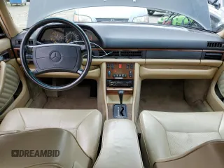 1990 Mercedes-Benz 420 with VIN WDBCA35E8LA539818, listed as a Copart auction lot 45764444 with 219,036 mi miles and Salvage Title. Bid and sale history available at carsss.com. Image 8.