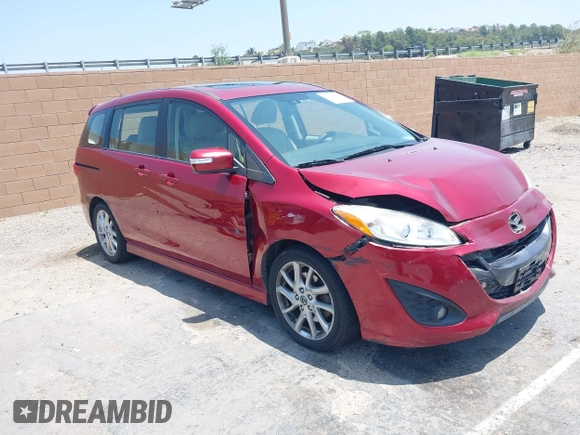 2015 Mazda 5 Grand Touring with VIN JM1CW2DL6F0190312, listed as a IAAI auction lot 42433782 with 79,140 mi miles and . Bid and sale history available at DreamBid. Image 1.