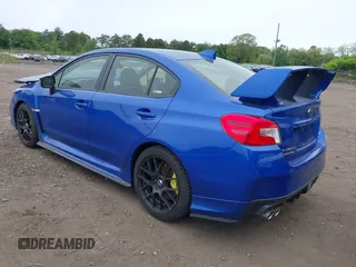 2020 Subaru WRX STI with VIN JF1VA2E61L9833954, listed as a IAAI auction lot 42336349 with 58,668 mi miles and . Bid and sale history available at DreamBid. Image 3.