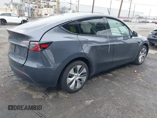 2023 Tesla Model Y Long Range with VIN 7SAYGDEE3PA152683, listed as a IAAI auction lot 41798988 with 14,063 mi miles and . Bid and sale history available at carsss.com. Image 4.