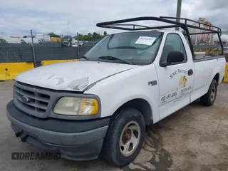 2002 Ford F-150 XL with VIN 1FTRF172X2KE34789, listed as a IAAI auction lot 42138397 with 188,960 mi miles and . Bid and sale history available at DreamBid. Image 2.