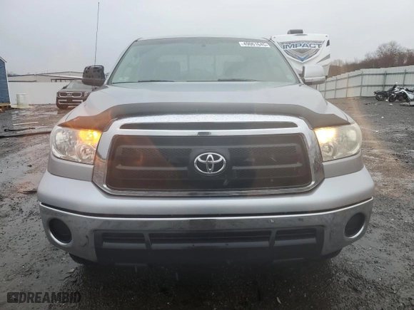 2010 Toyota Tundra 4WD Truck with VIN 5TFUY5F10AX102267, listed as a Copart auction lot 49061645 with 214,105 mi miles and Clean Title. Bid and sale history available at carsss.com. Image 5.