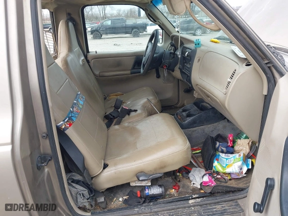 2003 Ford Ranger XL with VIN 1FTYR10U73PB00559, listed as a IAAI auction lot 41203236 with 192,029 mi miles. Bid and sale history available at carsss.com. Image 5.