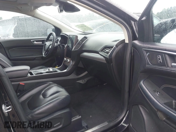 2021 Ford Edge Titanium z VIN 2FMPK3K99MBA16882, wystawiony jako IAAI lot #42214606 z przebiegiem 140 031 mil mil oraz . Historia ofert i sprzedaży dostępna na DreamBid. Obrazek 5.