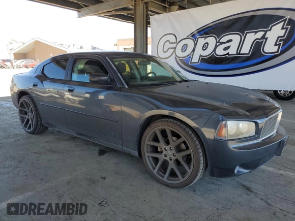 2007 Dodge Charger z VIN 2B3KA43G27H864237, wystawiony jako Copart lot #56039375 z przebiegiem 172 236 mil mil oraz Czysty tytuł • Clean title. Historia ofert i sprzedaży dostępna na DreamBid. Obrazek 4.