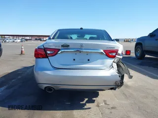 2016 Nissan Maxima SL z VIN 1N4AA6AP3GC377081, wystawiony jako IAAI lot #42235817 z przebiegiem 159 571 mil mil oraz . Historia ofert i sprzedaży dostępna na DreamBid. Obrazek 16.