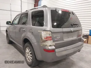2008 Mercury Mariner Premier z VIN 4M2CU87108KJ15433, wystawiony jako IAAI lot #41924055 z przebiegiem 168 569 mil mil oraz . Historia ofert i sprzedaży dostępna na DreamBid. Obrazek 3.