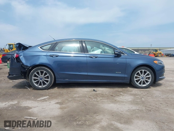 2018 Ford Fusion Energi SE with VIN 3FA6P0PU0JR196091, listed as a IAAI auction lot 42017867 with 70,284 mi miles. Bid and sale history available at carsss.com. Image 13.