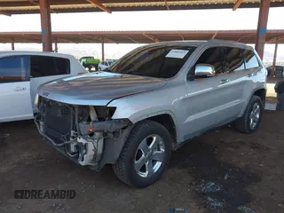 2012 Jeep Grand Cherokee Limited with VIN 1C4RJEBG7CC227488, listed as a IAAI auction lot 41881061 with 185,327 mi miles. Bid and sale history available at carsss.com. Image 2.