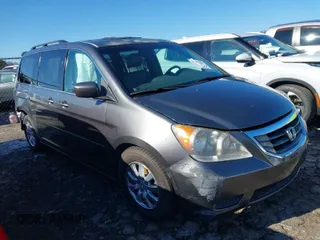 2010 Honda Odyssey EX-L with VIN 5FNRL3H72AB030105, listed as a IAAI auction lot 41251489 with 236,111 mi miles. Bid and sale history available at carsss.com. Image 1.