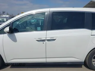 2016 Honda Odyssey SE with VIN 5FNRL5H33GB043303, listed as a IAAI auction lot 42215233 with 67,097 mi miles and . Bid and sale history available at DreamBid. Image 14.