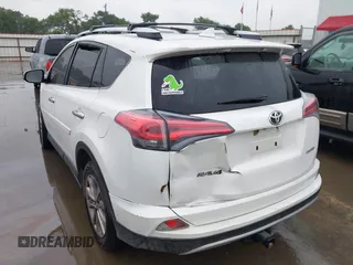 2016 Toyota RAV4 Limited with VIN JTMYFREV6GJ061593, listed as a IAAI auction lot 42188936 with 180,361 mi miles and . Bid and sale history available at DreamBid. Image 3.