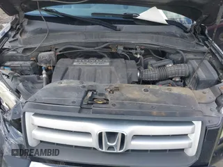 2006 Honda Pilot EX-L with VIN 2HKYF18506H530715, listed as a IAAI auction lot 42195804 with 252,295 mi miles and . Bid and sale history available at DreamBid. Image 10.