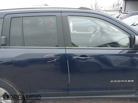 2015 Jeep Compass Sport with VIN 1C4NJCBB5FD115844, listed as a IAAI auction lot 41291608 with 79,819 mi miles and . Bid and sale history available at DreamBid. Image 14.