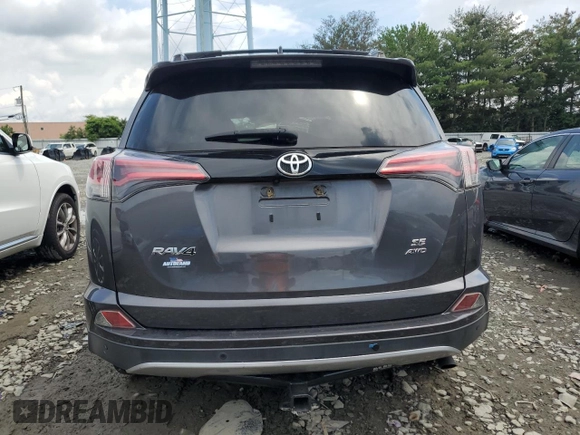 2017 Toyota RAV4 SE with VIN JTMJFREV3HJ710737, listed as a Copart auction lot 62915555 with 121,183 mi miles and Salvage title. Bid and sale history available at DreamBid. Image 6.