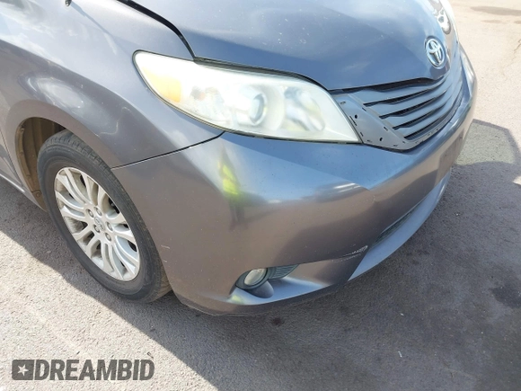 2014 Toyota Sienna XLE with VIN 5TDYK3DC2ES438980, listed as a IAAI auction lot 42067750 with 143,728 mi miles and . Bid and sale history available at DreamBid. Image 6.