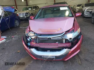 2010 Honda Insight EX z VIN JHMZE2H7XAS001280, wystawiony jako IAAI lot #41982398 z przebiegiem 142 434 mil mil oraz . Historia ofert i sprzedaży dostępna na DreamBid. Obrazek 12.