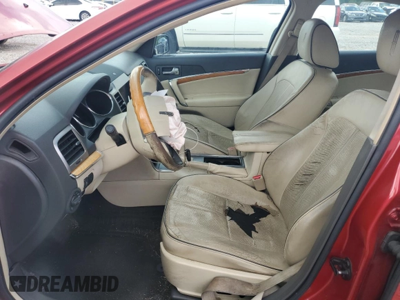 2010 Lincoln MKZ z VIN 3LNHL2GC7AR650494, wystawiony jako Copart lot #55113205 z przebiegiem 187 116 mil mil oraz Szkoda całkowita • Salvage title. Historia ofert i sprzedaży dostępna na DreamBid. Obrazek 7.