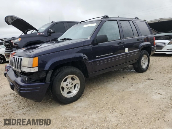 1998 Jeep Grand Cherokee with VIN 1J4FX48S1WC244308, listed as a Copart auction lot 74384714 with Not provided miles and Non repairable. Bid and sale history available at DreamBid. Image 1.