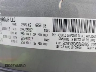 2014 Dodge Grand Caravan American Value with VIN 2C4RDGBG0ER168085, listed as a IAAI auction lot 42020959 with 213,383 mi miles and . Bid and sale history available at DreamBid. Image 9.