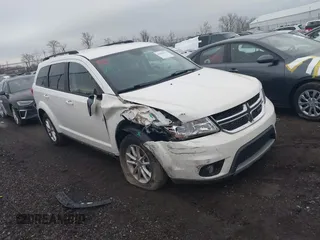 2014 Dodge Journey SXT with VIN 3C4PDCBB8ET153190, listed as a IAAI auction lot 41854655 with 153,048 mi miles and . Bid and sale history available at DreamBid. Image 1.