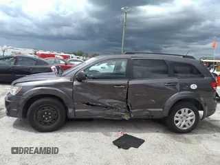 2018 Dodge Journey SE with VIN 3C4PDCAB4JT296083, listed as a IAAI auction lot 41976090 with 63,051 mi miles and . Bid and sale history available at DreamBid. Image 6.