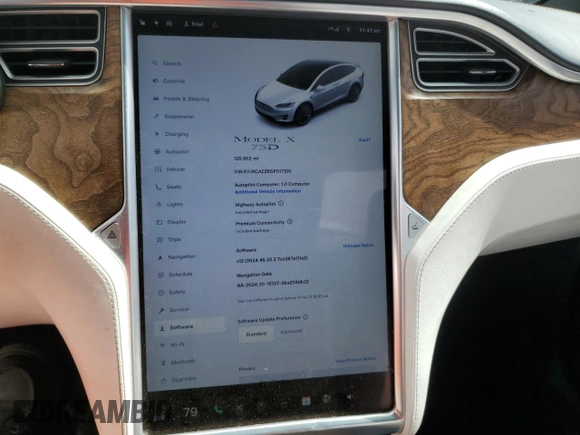 2016 Tesla Model X 70D with VIN 5YJXCAE28GF017100, listed as a Copart auction lot 50081235 with 126,962 mi miles and Salvage Title. Bid and sale history available at DreamBid. Image 9.
