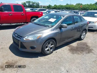 2013 Ford Focus SE z VIN 1FADP3F20DL235001, wystawiony jako IAAI lot #42343368 z przebiegiem 202 356 mil mil oraz . Historia ofert i sprzedaży dostępna na DreamBid. Obrazek 2.