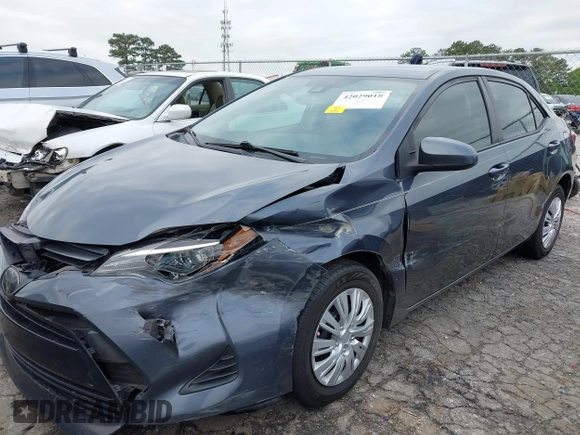 2019 Toyota Corolla L with VIN 5YFBURHE8KP936426, listed as a IAAI auction lot 42029018 with 190,163 mi miles and . Bid and sale history available at DreamBid. Image 6.