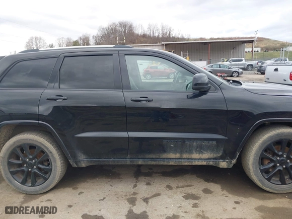 2018 Jeep Grand Cherokee Laredo E with VIN 1C4RJFAG3JC324434, listed as a IAAI auction lot 41812311 with 140,820 mi miles. Bid and sale history available at carsss.com. Image 13.