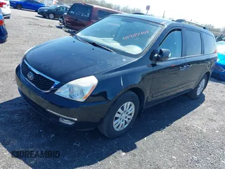 2014 Kia Sedona LX with VIN KNDMG4C71E6579260, listed as a IAAI auction lot 41985403 with 93,523 mi miles. Bid and sale history available at carsss.com. Image 17.