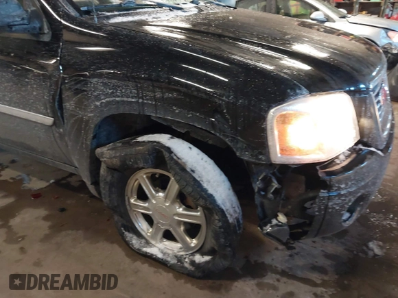 2007 GMC Envoy SLE with VIN 1GKDT13S472123167, listed as a IAAI auction lot 41385620 with 157,680 mi miles. Bid and sale history available at carsss.com. Image 6.