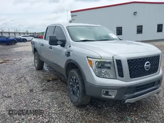 2017 Nissan Titan Pro-4X z VIN 1N6BA1F45HN529090, wystawiony jako IAAI lot #42163486 z przebiegiem 162 226 mil mil oraz . Historia ofert i sprzedaży dostępna na DreamBid. Obrazek 1.