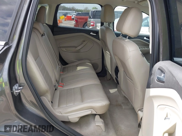 2015 Ford Escape Titanium with VIN 1FMCU0J90FUA25086, listed as a IAAI auction lot 41993681 with 126,170 mi miles. Bid and sale history available at carsss.com. Image 8.