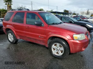 2007 Ford Escape Hybrid with VIN 1FMCU49HX7KA35267, listed as a Copart auction lot 49123395 with 318,091 mi miles and Clean Title. Bid and sale history available at carsss.com. Image 4.