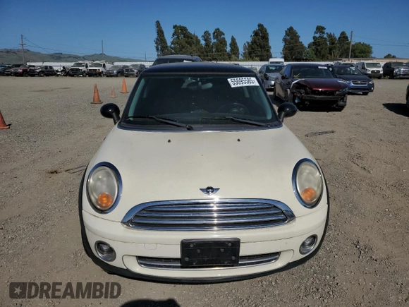 2010 MINI Hardtop with VIN WMWMF3C5XATZ66863, listed as a Copart auction lot 55695585 with 59,294 mi miles and Clean Title. Bid and sale history available at DreamBid. Image 5.