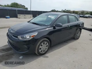 2023 Kia Rio S z VIN 3KPA24AD4PE549256, wystawiony jako Copart lot #57940455 z przebiegiem 30 177 mil mil oraz Szkody całkowita. Historia ofert i sprzedaży dostępna na DreamBid. Obrazek 1.